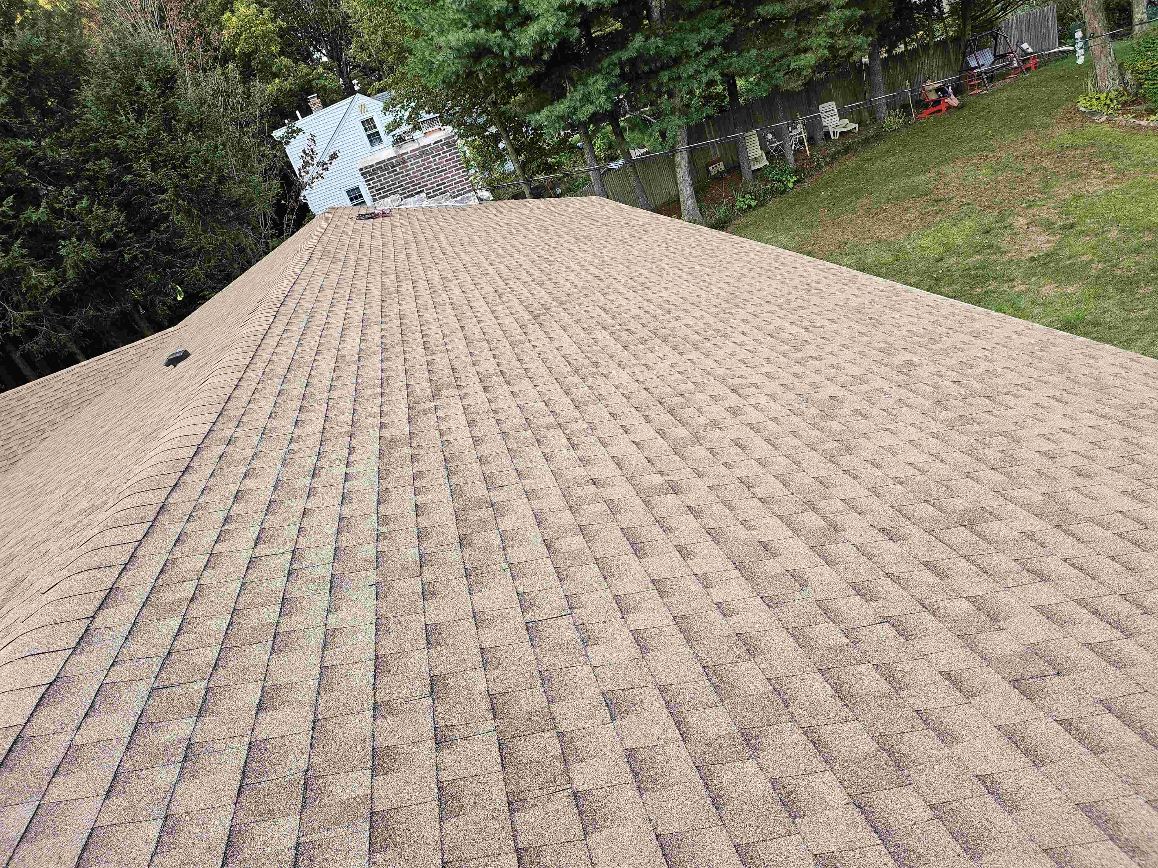 workers ripping roof