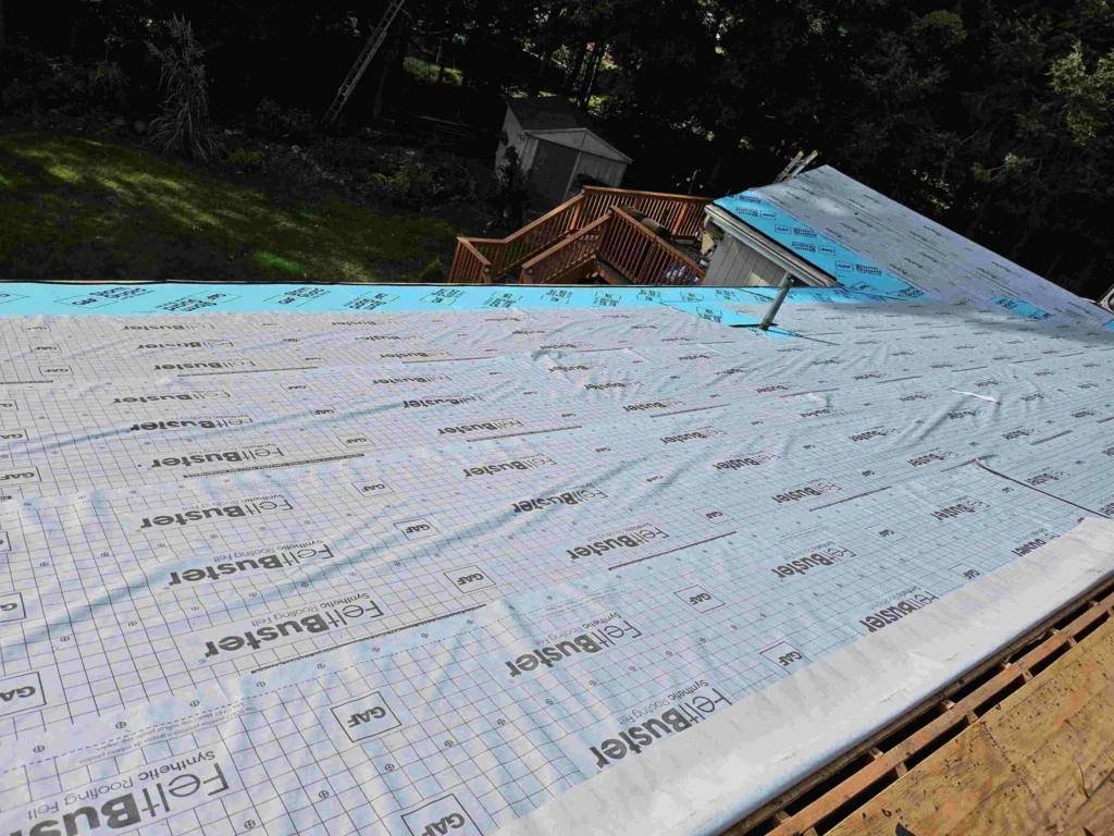 workers ripping roof