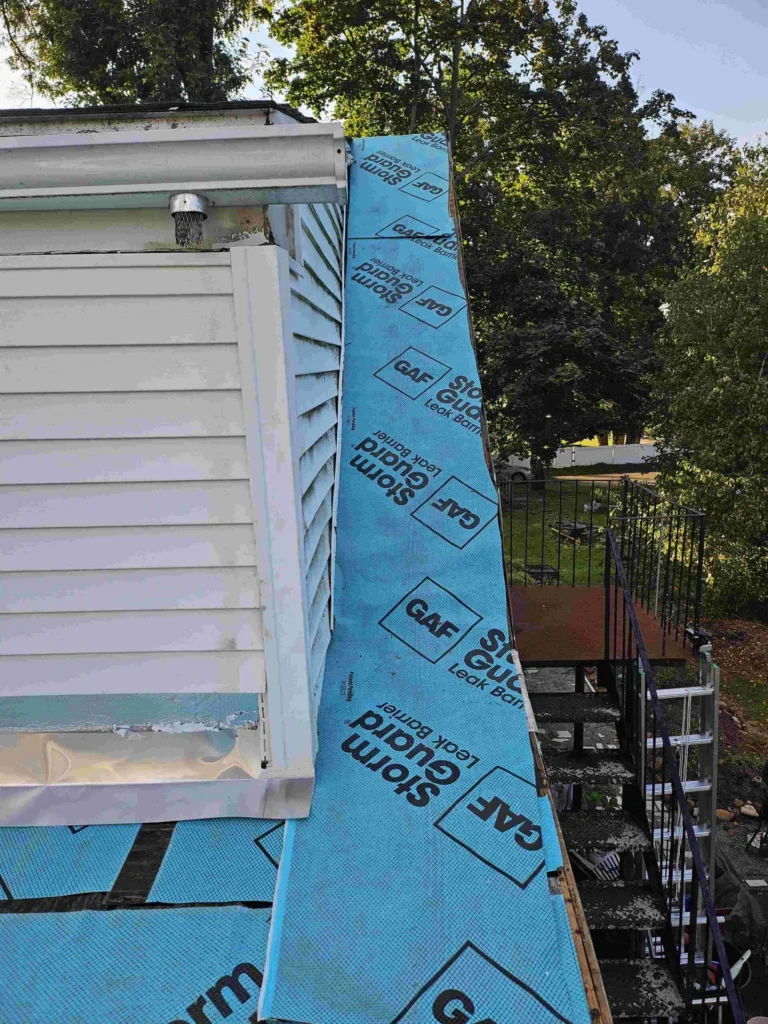 workers ripping roof