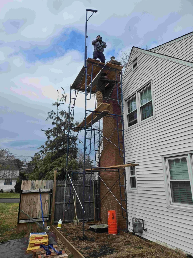 workers ripping roof