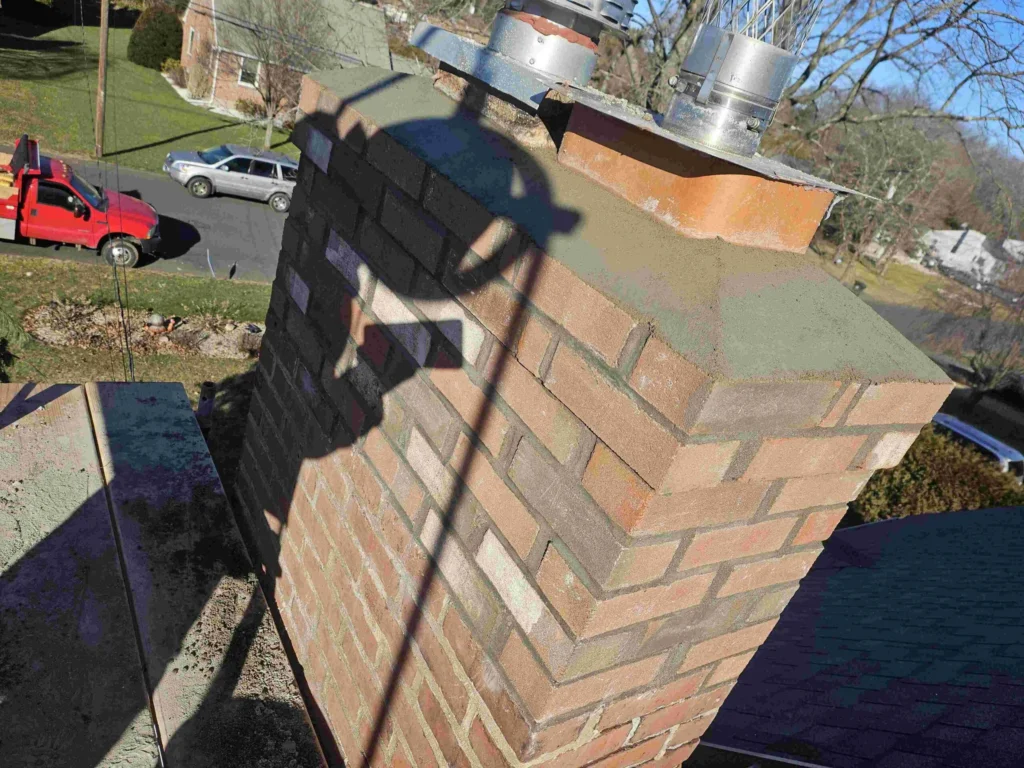 workers ripping roof